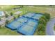 Community tennis, basketball and volleyball courts with walking trails and green space in a Gathering-friendly neighborhood at 20142 Lace Cascade Rd, Land O Lakes, FL 34637