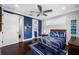 Inviting bedroom with hardwood floors, neutral colors, and plenty of natural light at 2149 Bayou Grande Ne Blvd, St Petersburg, FL 33703