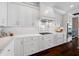 Modern kitchen with custom cabinets, designer backsplash, granite countertops, and premium stainless steel appliances at 2149 Bayou Grande Ne Blvd, St Petersburg, FL 33703