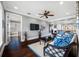 Comfortable living room features a ceiling fan and leads into a bright office space at 2149 Bayou Grande Ne Blvd, St Petersburg, FL 33703