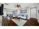 Bright and airy living room features stylish furnishings and a decorative mirror at 2149 Bayou Grande Ne Blvd, St Petersburg, FL 33703