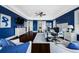 Main bedroom with tray ceilings, hardwood floors, and a white ceiling fan at 2149 Bayou Grande Ne Blvd, St Petersburg, FL 33703