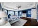 Spacious main bedroom with tray ceilings, hardwood floors, and a water view at 2149 Bayou Grande Ne Blvd, St Petersburg, FL 33703