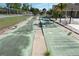 Outdoor shuffleboard courts perfect for friendly competition and community gatherings at 2200 Marshall Dr, Dunedin, FL 34698