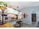Inviting kitchen and breakfast bar area, great for entertaining, featuring natural light and ample storage at 2200 Marshall Dr, Dunedin, FL 34698