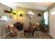 Inviting living room with comfortable seating, eclectic decor, and natural light at 2200 Marshall Dr, Dunedin, FL 34698