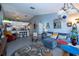 Open-concept living area with vaulted ceiling, stylish furnishings, and seamless flow to the kitchen at 2200 Marshall Dr, Dunedin, FL 34698