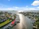 Aerial view of a waterfront property with private boat dock and stunning views of the intercoastal waterway at 2387 Hanover Dr # 2387, Dunedin, FL 34698
