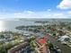 Waterfront townhomes feature private boat slips with direct access to the bay, under a partly cloudy sky at 2387 Hanover Dr # 2387, Dunedin, FL 34698