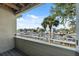 Balcony view of the canal featuring boat docks and waterfront homes at 2387 Hanover Dr # 2387, Dunedin, FL 34698