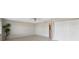 Bedroom featuring tile floors, ceiling fan, closet, and a window bringing in natural light at 2387 Hanover Dr # 2387, Dunedin, FL 34698