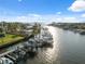 Beautiful waterfront view featuring private boat docks, tranquil water, and canal access to the bay at 2387 Hanover Dr # 2387, Dunedin, FL 34698