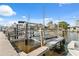 Private boat lift on a canal with easy access to waterfront activities at 2387 Hanover Dr # 2387, Dunedin, FL 34698