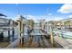 Private boat lift on a canal with easy access to waterfront activities at 2387 Hanover Dr # 2387, Dunedin, FL 34698