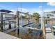 Private boat lift on a canal with easy access to waterfront activities at 2387 Hanover Dr # 2387, Dunedin, FL 34698