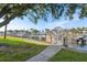 Gated access to canal and docks with lush lawn and views of the canal at 2387 Hanover Dr # 2387, Dunedin, FL 34698