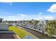 An aerial waterfront view of docks and homes, showcasing an ideal location for boaters and water enthusiasts at 2387 Hanover Dr # 2387, Dunedin, FL 34698