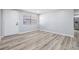 Bright and airy living room with neutral walls and modern flooring at 2551 Fentress Pl, Holiday, FL 34691