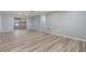 Bright and airy living room with neutral walls and modern flooring at 2551 Fentress Pl, Holiday, FL 34691