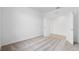 Neutral bedroom with carpeted floors and an open doorway to another room at 2760 Winding Creek Trl, North Port, FL 34289