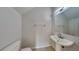Half bathroom with tile flooring, pedestal sink, and neutral paint at 2837 Santego Bay Ct, Brandon, FL 33511