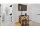 Walk-in closet with shelving and hanging space and a view of the hall with a TV at 3607 W Roland St, Tampa, FL 33609