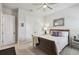 Bright bedroom featuring a comfortable bed and neutral decor with closet at 3607 W Roland St, Tampa, FL 33609