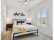 Inviting bedroom featuring a comfortable bed, ample natural light, and modern decor at 3607 W Roland St, Tampa, FL 33609