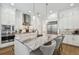 Spacious kitchen with marble countertops, stainless steel appliances, and an island with bar seating at 3607 W Roland St, Tampa, FL 33609