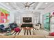 Bright living room with coffered ceilings, large sliding doors, and stylish contemporary furniture at 3607 W Roland St, Tampa, FL 33609
