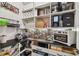 Organized pantry with plenty of shelving, counter space, and storage drawers at 3607 W Roland St, Tampa, FL 33609
