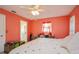 Comfortable bedroom with ceiling fan, closet, and ensuite bathroom at 413 Blackburn Rd, Nokomis, FL 34275