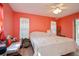 Bedroom with ceiling fan, hardwood floors, and closet at 413 Blackburn Rd, Nokomis, FL 34275