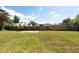 Wide fenced backyard and patio area provide privacy and space for outdoor activities or entertainment at 4507 26Th S Ave, Tampa, FL 33619