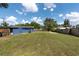 Spacious backyard with a well-maintained lawn and privacy fence at 4507 26Th S Ave, Tampa, FL 33619