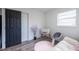 Comfortable bedroom featuring a bassinet, chair and stylish interior at 4507 26Th S Ave, Tampa, FL 33619