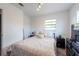 Comfortable bedroom featuring modern furnishings and plenty of natural light at 4507 26Th S Ave, Tampa, FL 33619