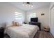 Cozy bedroom featuring a comfortable bed, modern lighting, and stylish decor at 4507 26Th S Ave, Tampa, FL 33619