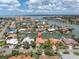 Aerial view showcases this waterfront property's prime location in a community with canal access at 4973 60Th S Ave, St Petersburg, FL 33715