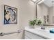 Bright bathroom features a sleek vanity and stylish decor at 4973 60Th S Ave, St Petersburg, FL 33715
