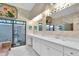 Luxurious bathroom featuring a soaking tub and large vanity at 4973 60Th S Ave, St Petersburg, FL 33715