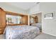 Comfortable bedroom with built-in storage and mirrored closet at 4973 60Th S Ave, St Petersburg, FL 33715