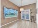 Bright breakfast nook with water views and access to patio at 4973 60Th S Ave, St Petersburg, FL 33715