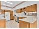 Bright kitchen with stainless steel appliances and ample counter space at 4973 60Th S Ave, St Petersburg, FL 33715