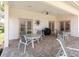 Spacious covered patio with multiple seating areas perfect for outdoor entertaining at 4973 60Th S Ave, St Petersburg, FL 33715