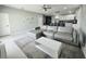Inviting living space featuring modern decor, a comfortable sectional sofa, and bright, open layout at 5180 69Th N Ave, Pinellas Park, FL 33781