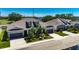 Aerial view of the home showcasing the well-manicured lawn and neighborhood at 5814 Stockport St, Riverview, FL 33578