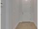 Bright entryway with a white front door, neutral-toned walls, and tile flooring at 5814 Stockport St, Riverview, FL 33578
