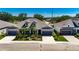 Charming new home with a well-maintained lawn, two-car garage, and modern design, in a suburban neighborhood with convenient location at 5814 Stockport St, Riverview, FL 33578