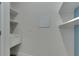 Bright laundry room with utility sink and built-in shelving at 5814 Stockport St, Riverview, FL 33578
